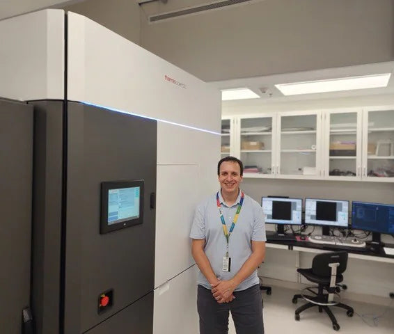 Dr. John Rubinstein standing in his Cryo-EM facility. 